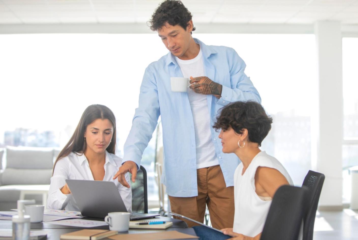 Office workspace showing budget workflow planning session